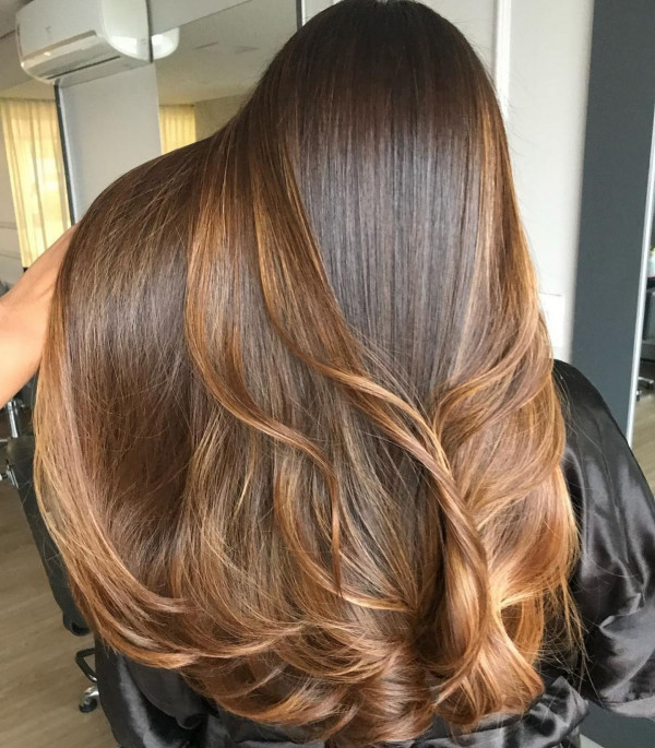 Salted Caramel Balayage — winter hair color idea for brown eyes