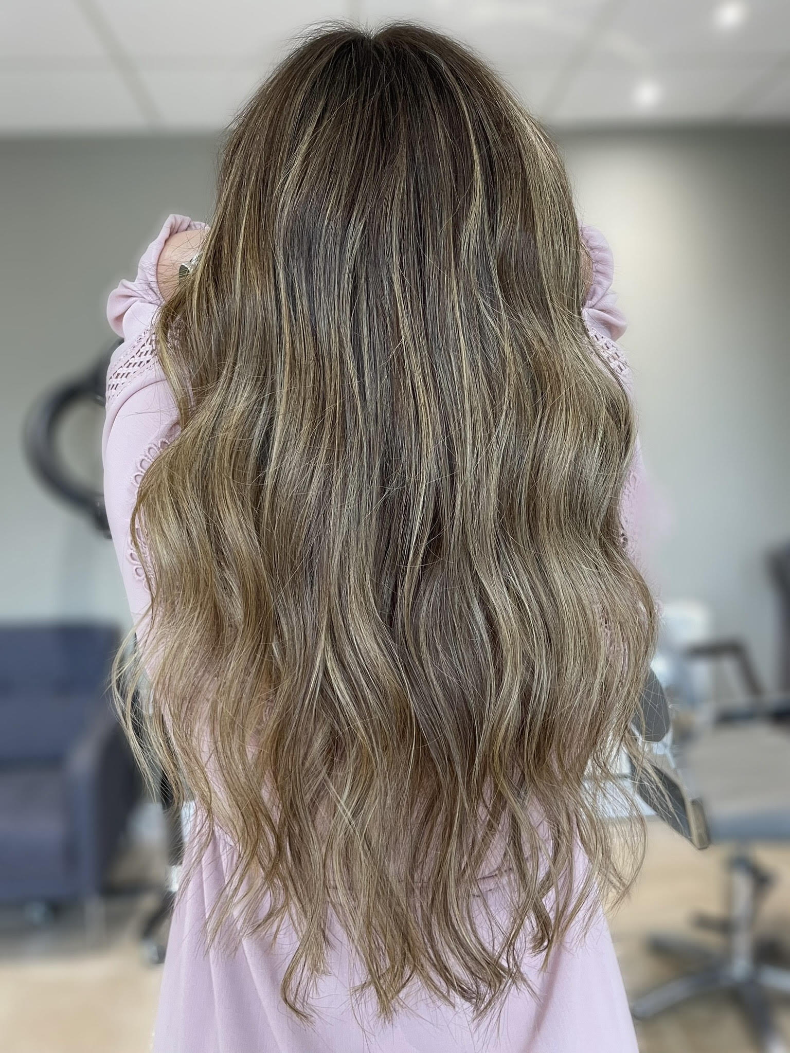 Dark brown hair with honey blonde balayage highlights