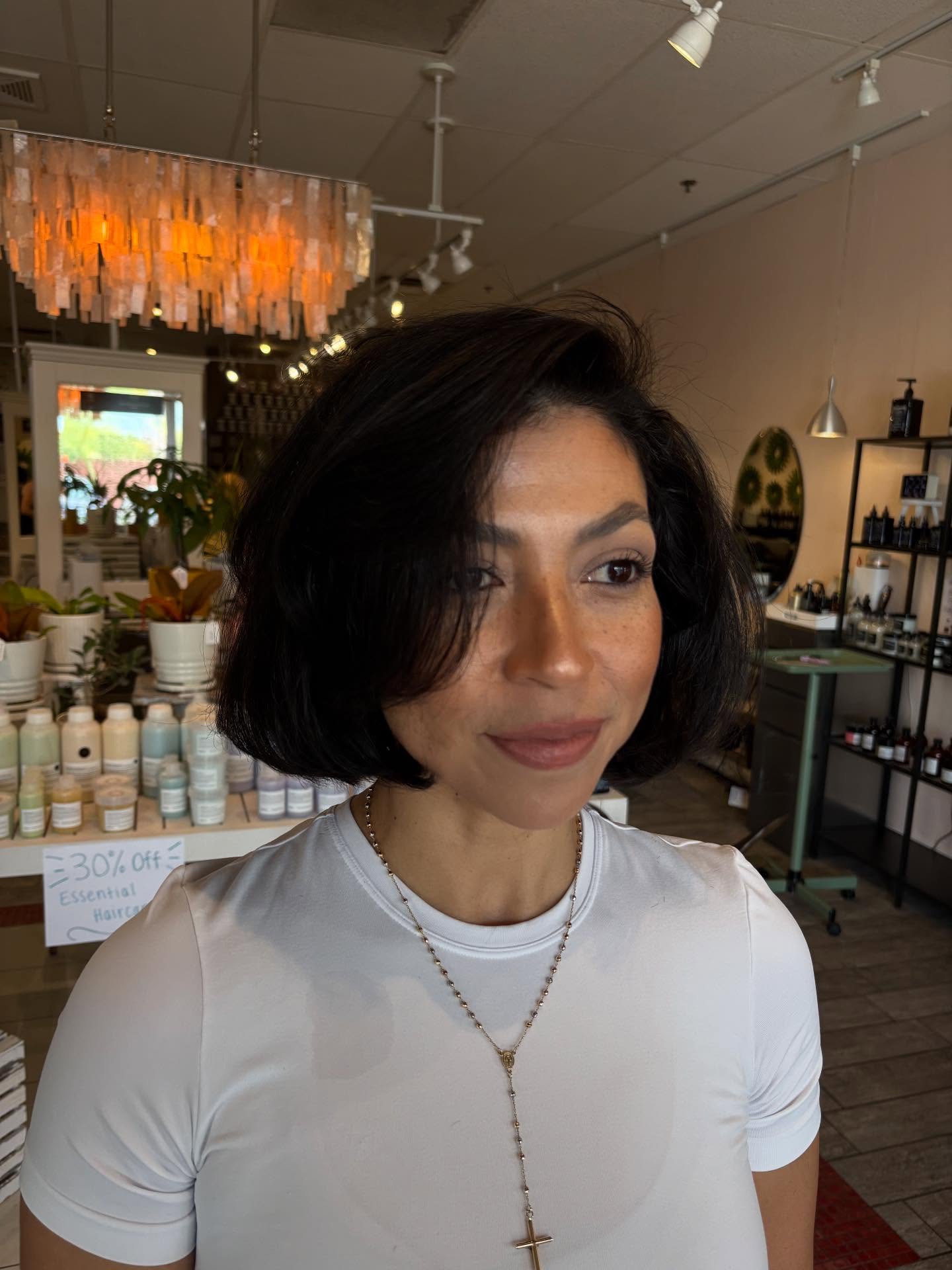 Rounded chin-length Italian bob with soft side-swept interior stack