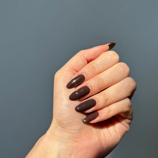 Hot Chocolate: a deep chocolate brown cream on medium almond nails
