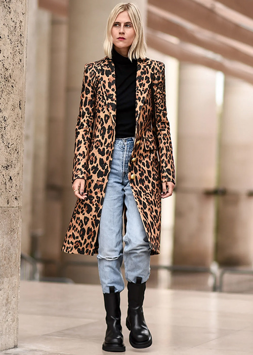 Long leopard coat with black turtleneck, light-wash jeans and chunky black boots