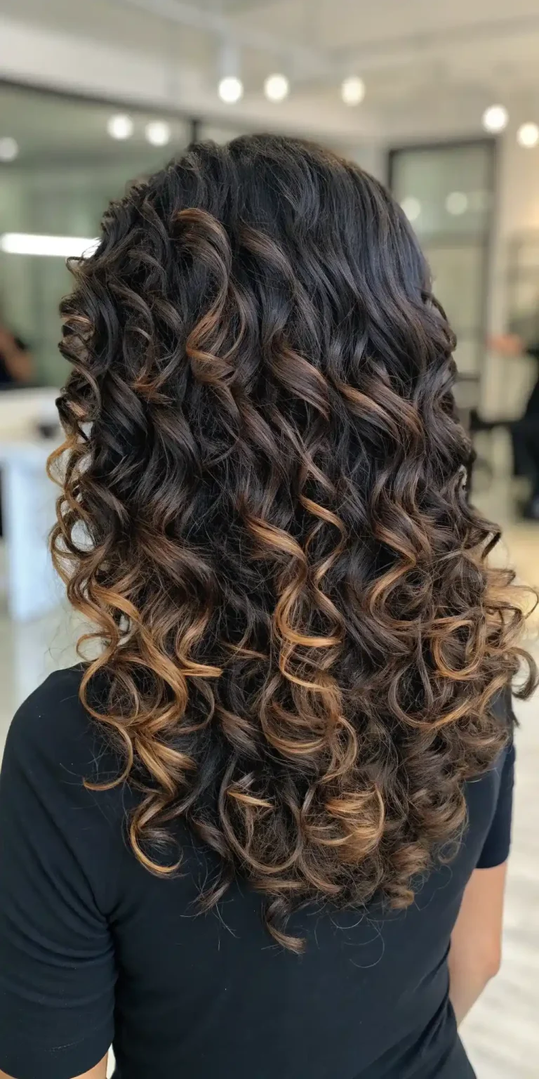 Dark brunette balayage on long curly hair, back view