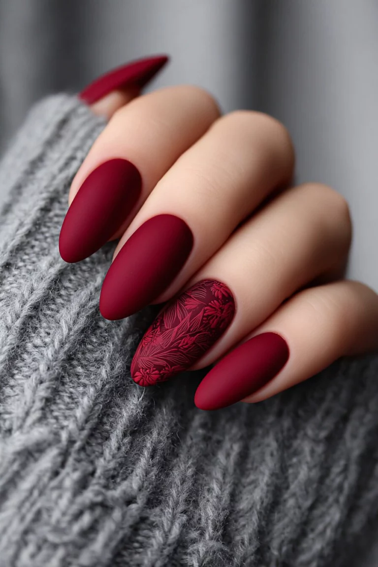 Deep burgundy matte nails in a winter manicure