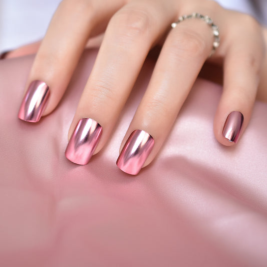 Short nails with rose gold chrome finish