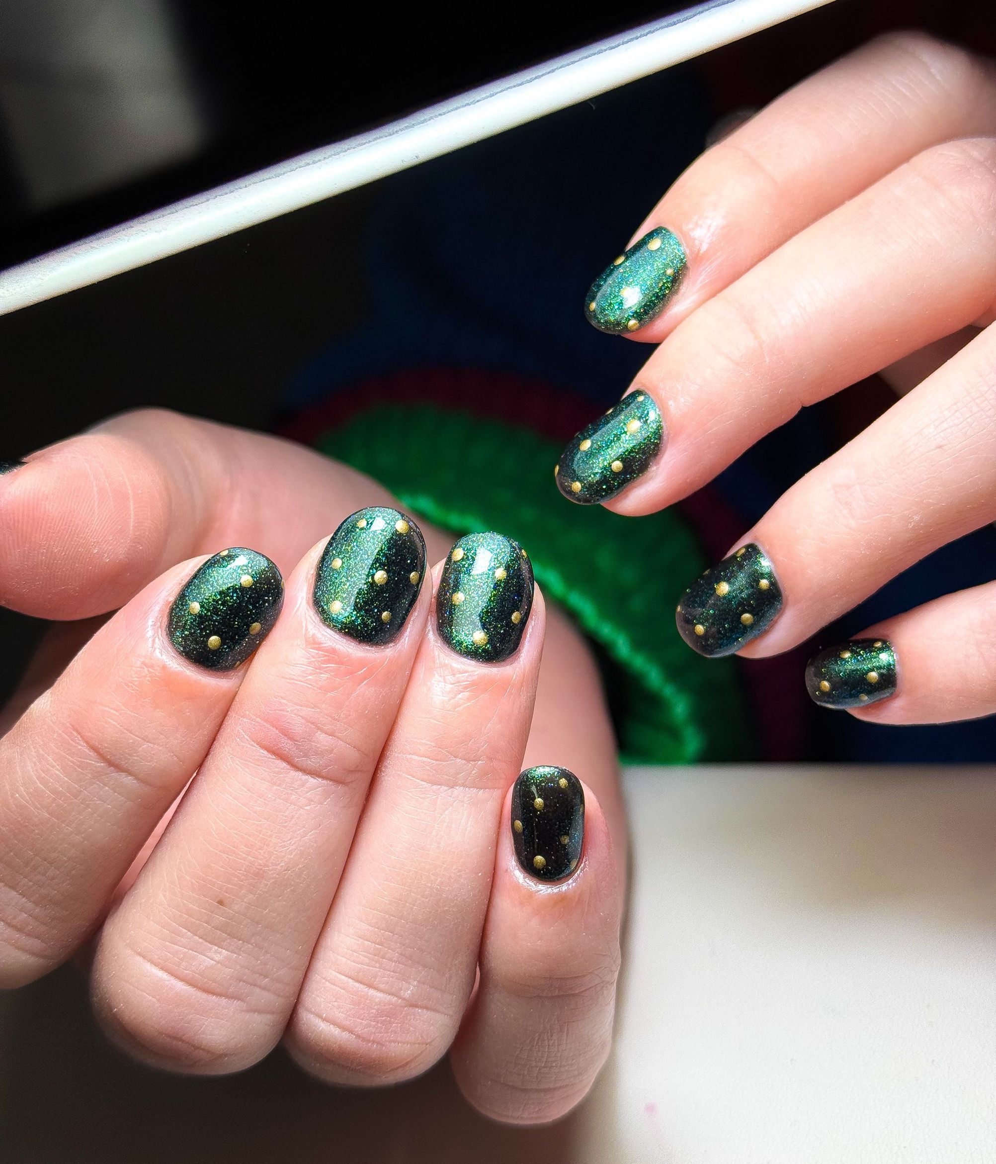 Pine Glitter: a green glitter polish on short squoval nails