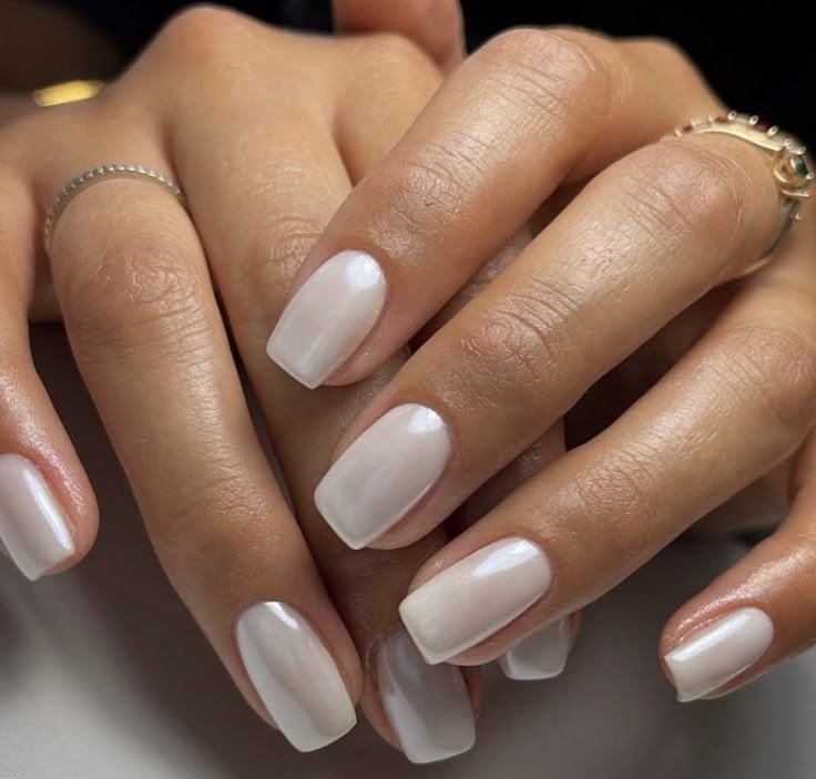 Pearl white manicure with an iridescent sheen