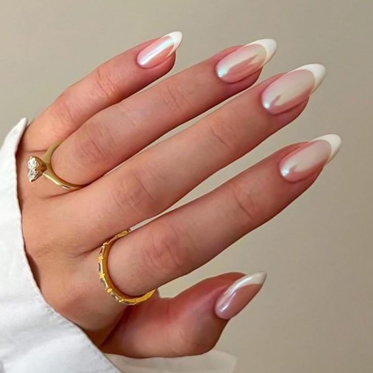 White chrome French tip nails with a mirror-like shimmer finish