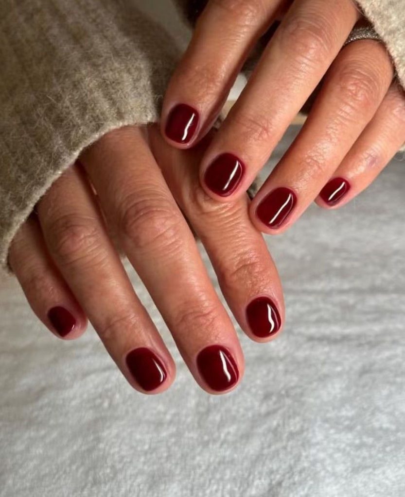 Short glossy burgundy squoval nails