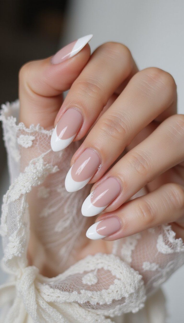 Ivory nails with velvet cat-eye shimmer in a subtle French style