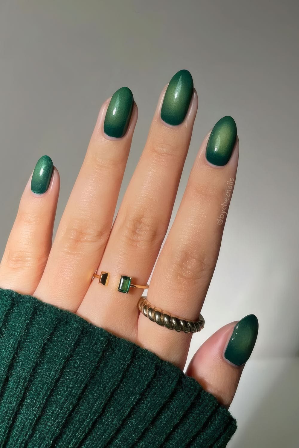 Emerald green aura nails with soft halo effect