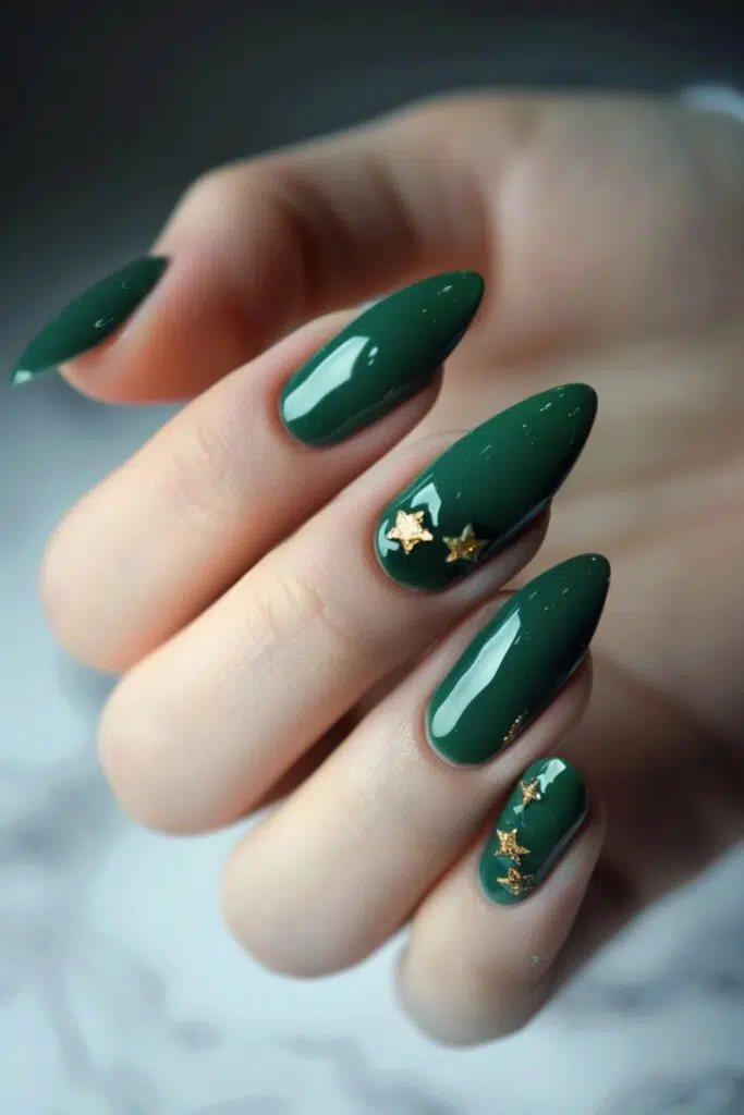 Short oval nails in jewel-toned emerald green polish
