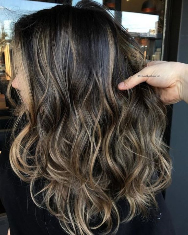 Dark brown wavy hair with ash blonde babylights