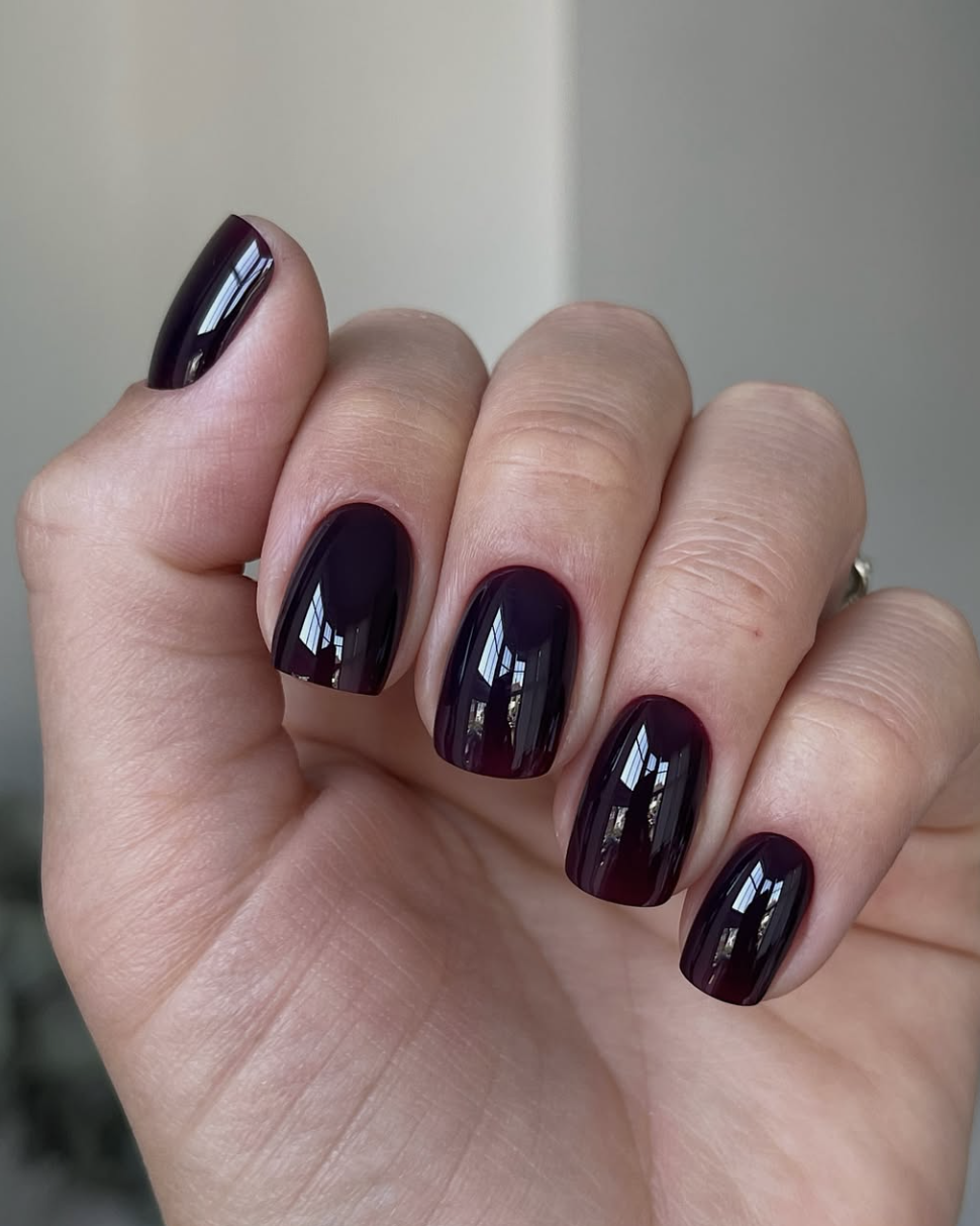 Dark plum glossy short nails