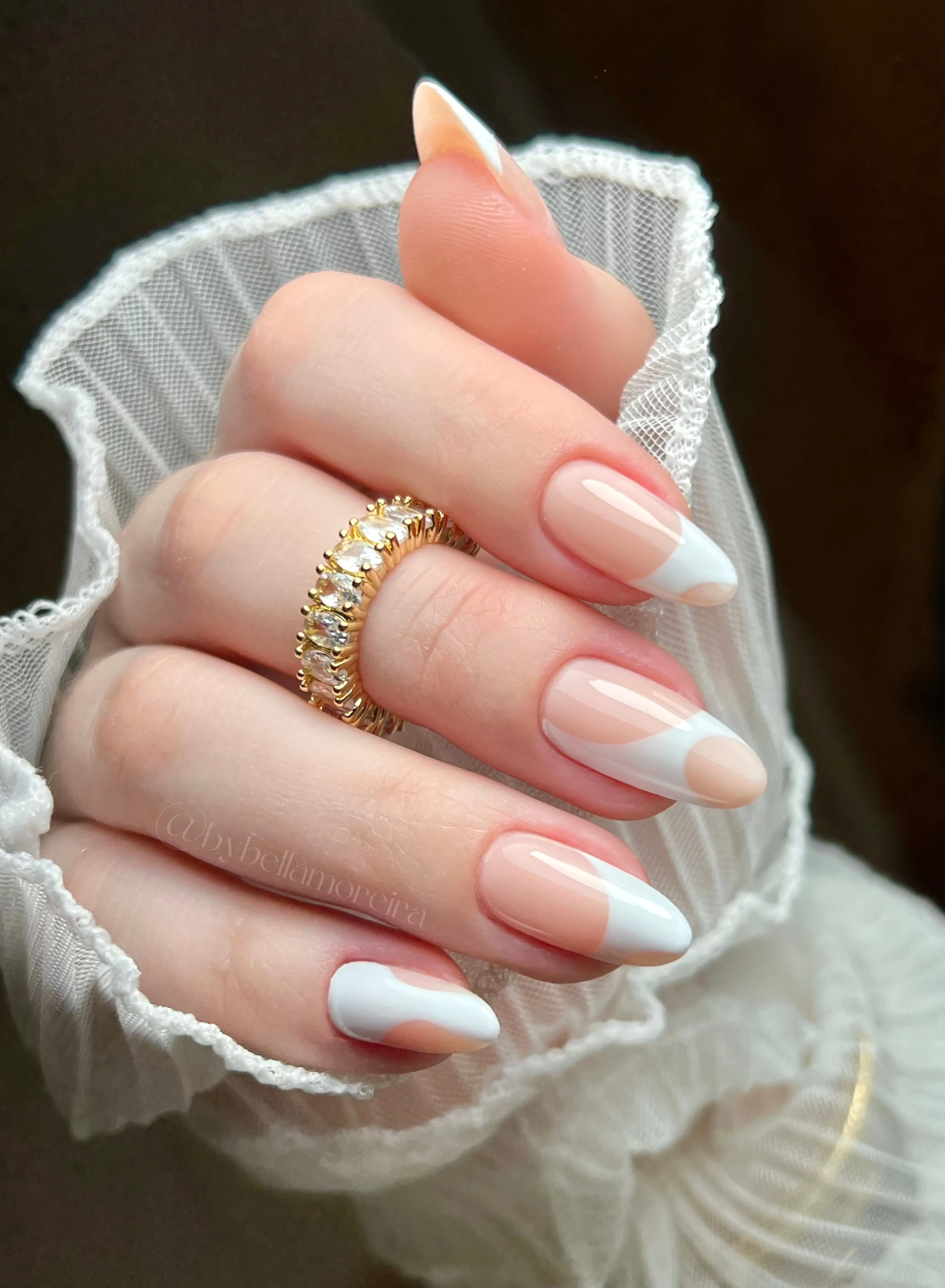 Nude almond nails with white French tips
