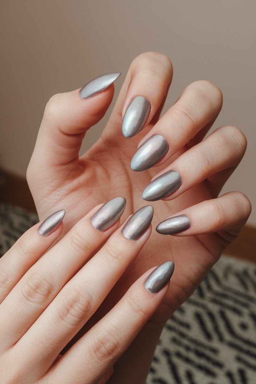 Pale grey glossy manicure on short natural nails