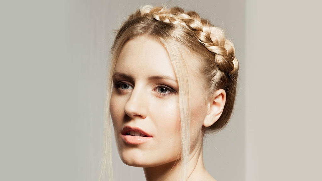 Blonde Gretchen crown braid with soft face-framing strands