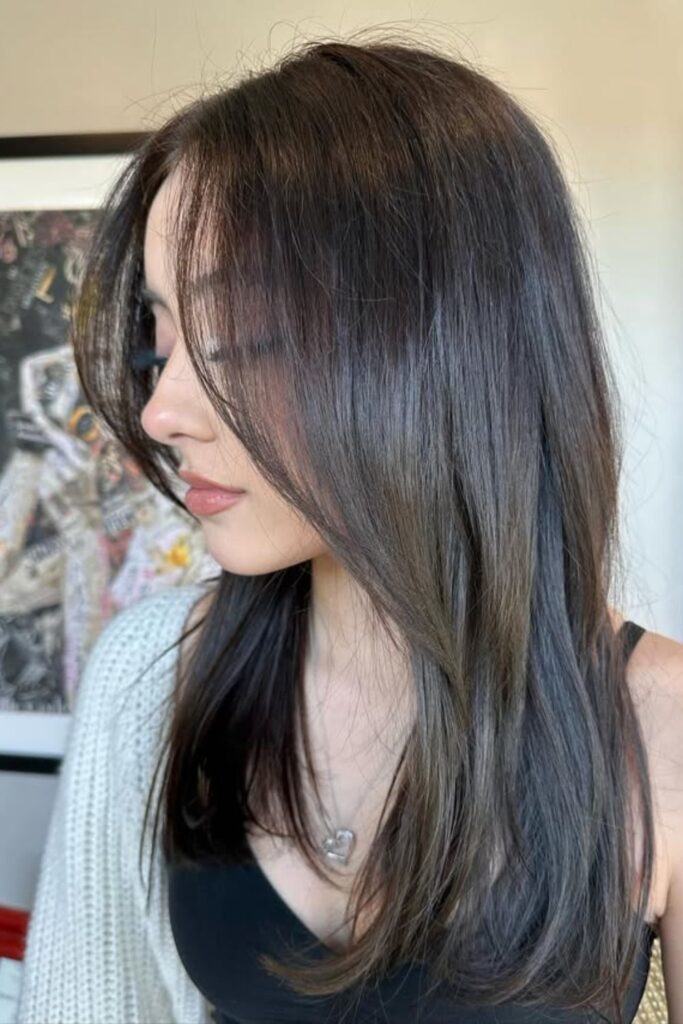 Long pin-straight espresso hair with subtle face-framing layers