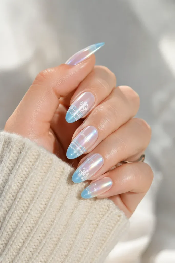 Icy blue chrome nails with white snowflake and star art
