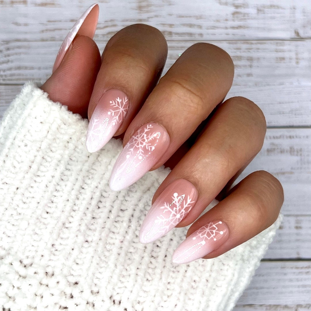 Teal and pink ombre press-on nails with snowflakes