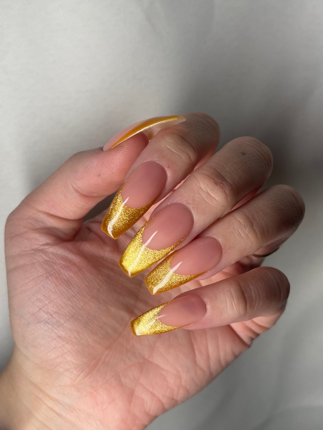 Gold glitter French tip press-on nails