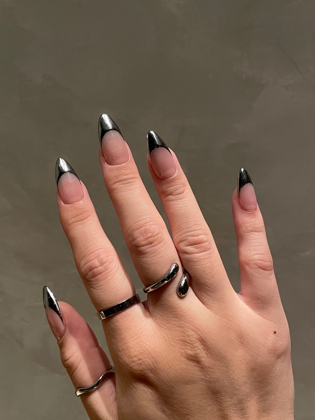 Black nails with silver chrome French tips