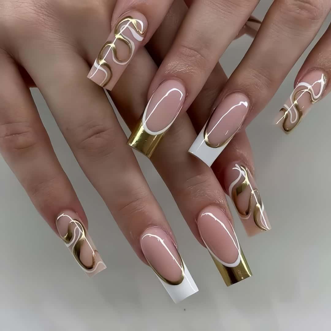 Nude french manicure with a tiny gold dot accent