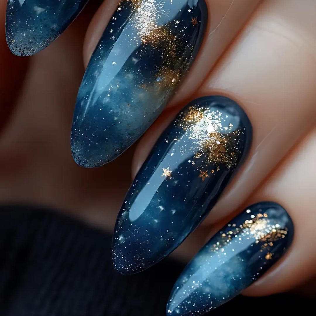 Navy blue nails with silver celestial star accents