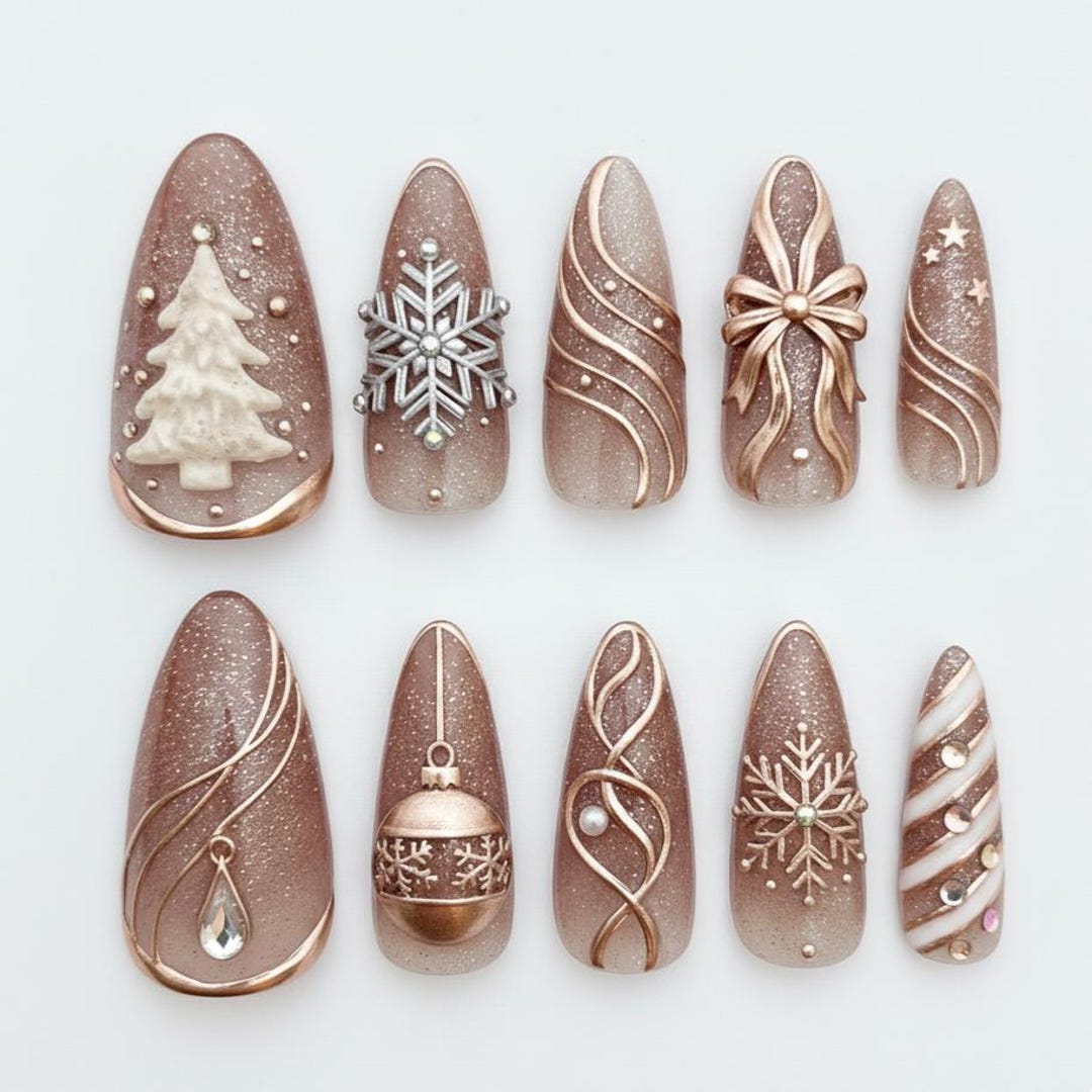 Medium almond press-on nails in rose gold shimmer with Christmas tree, snowflake and bow art