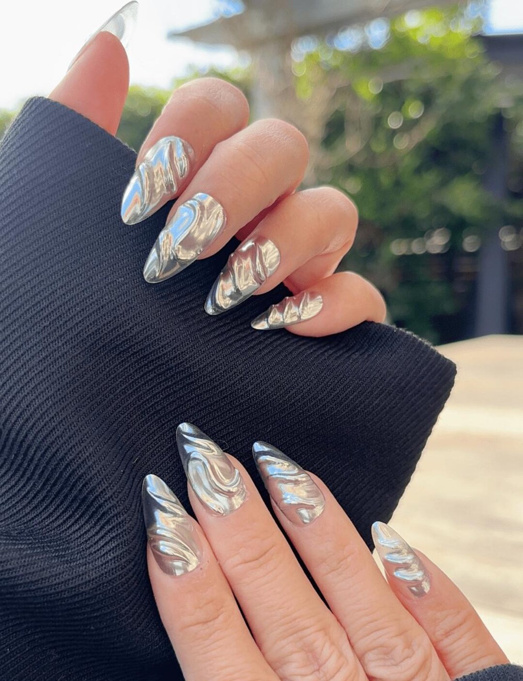 Silver chrome liquid metal swirl nail art