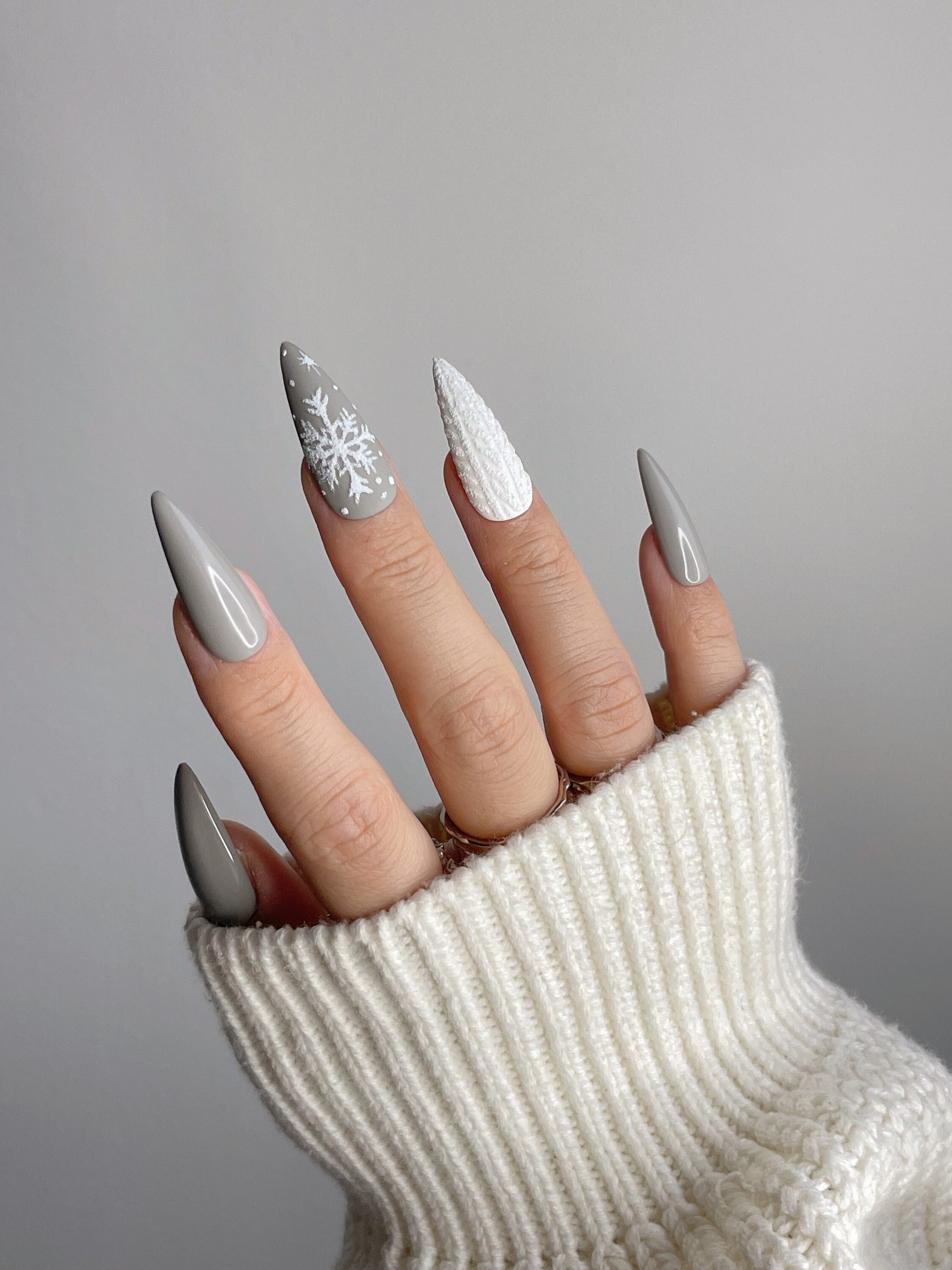 Cloud grey matte nails with glossy snowflake accent