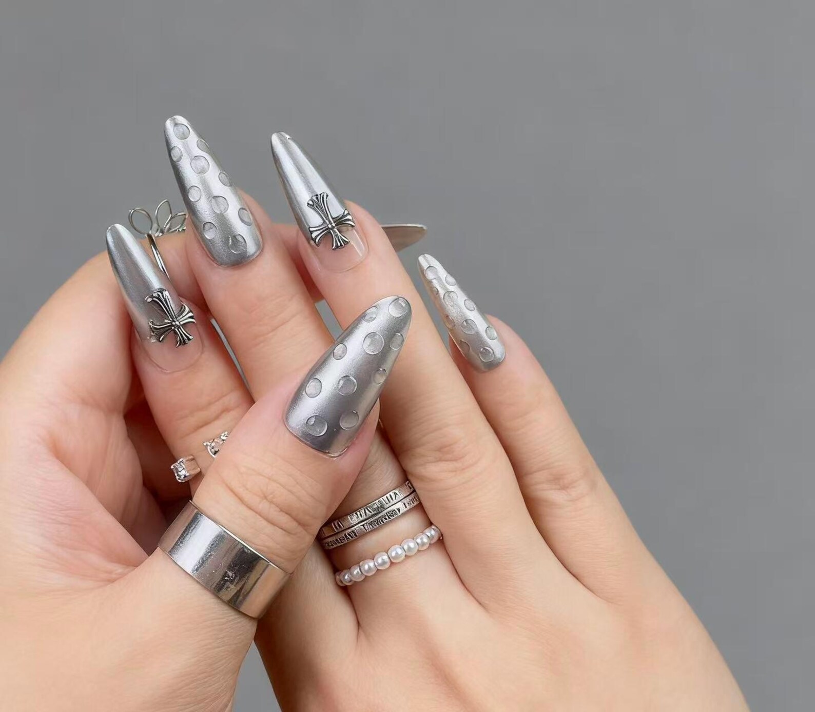 Silver chrome press-on nails with cross charms