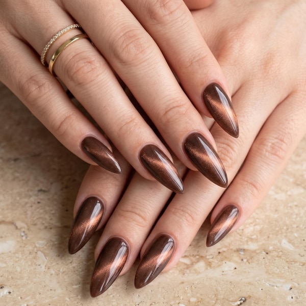 Copper cat eye nails with warm metallic shimmer