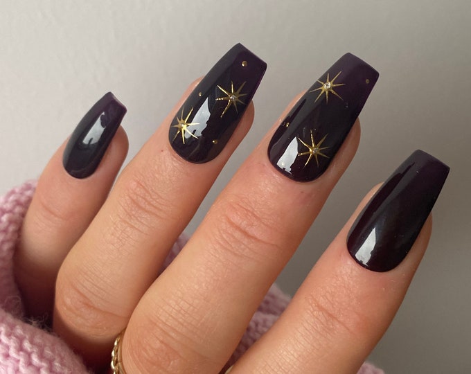 Midnight purple press-on nails with star art