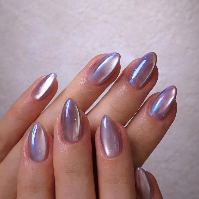 Lavender chrome nails with a pearly lilac shine
