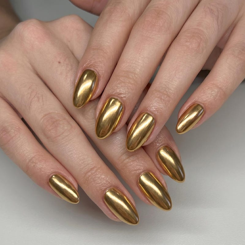 Almond nails in full gold mirror chrome