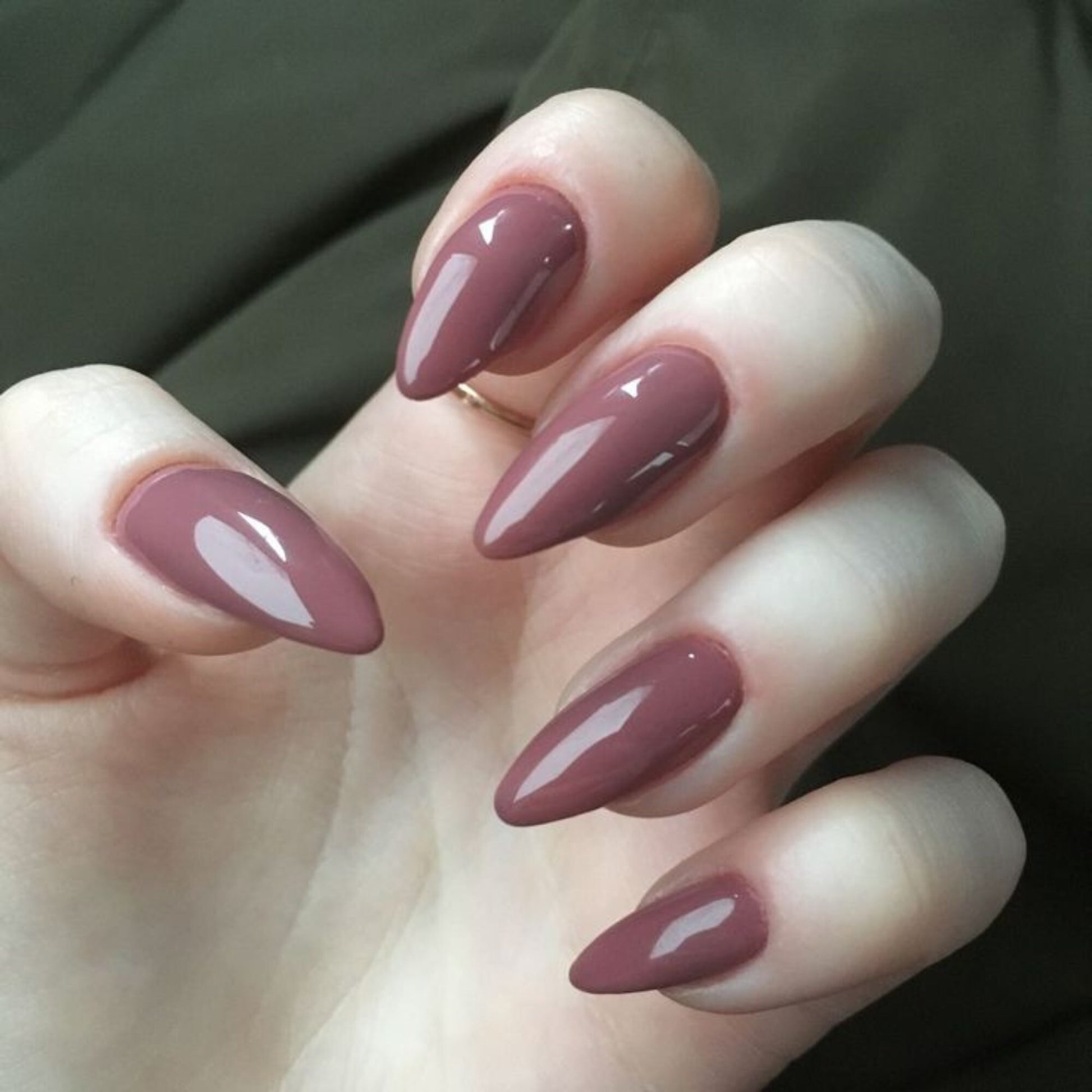 Dusty Mauve: a muted mauve cream on short oval nails