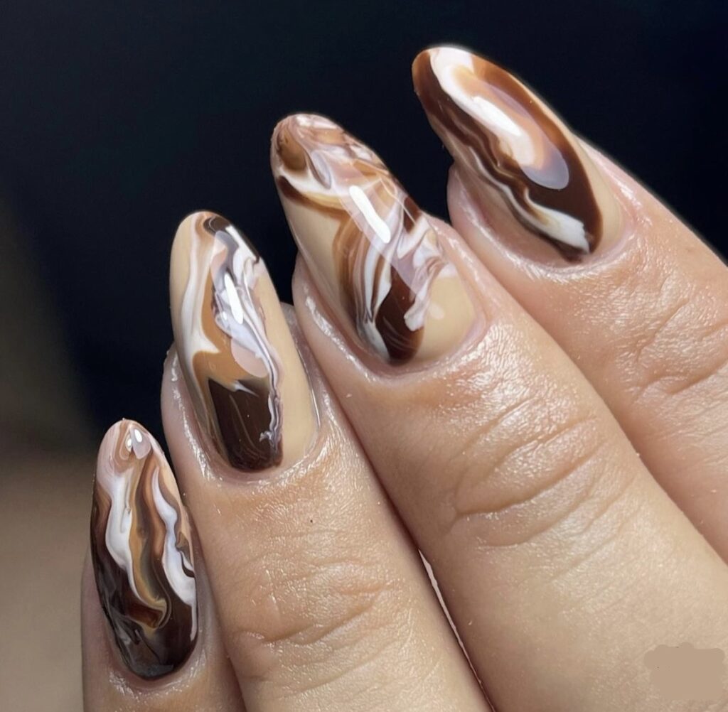 Nails with caramel latte marble swirl nail art