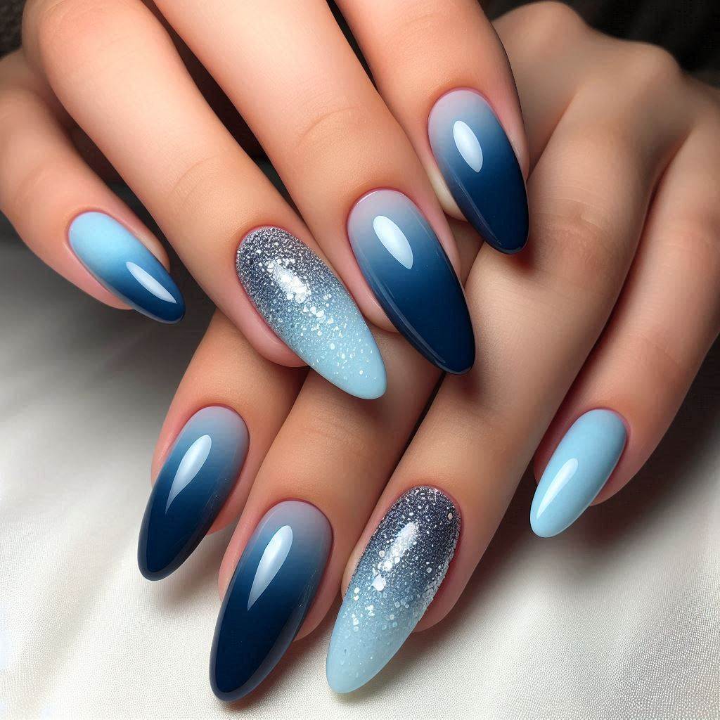 Oval nails with deep blue to light blue gradient ombre