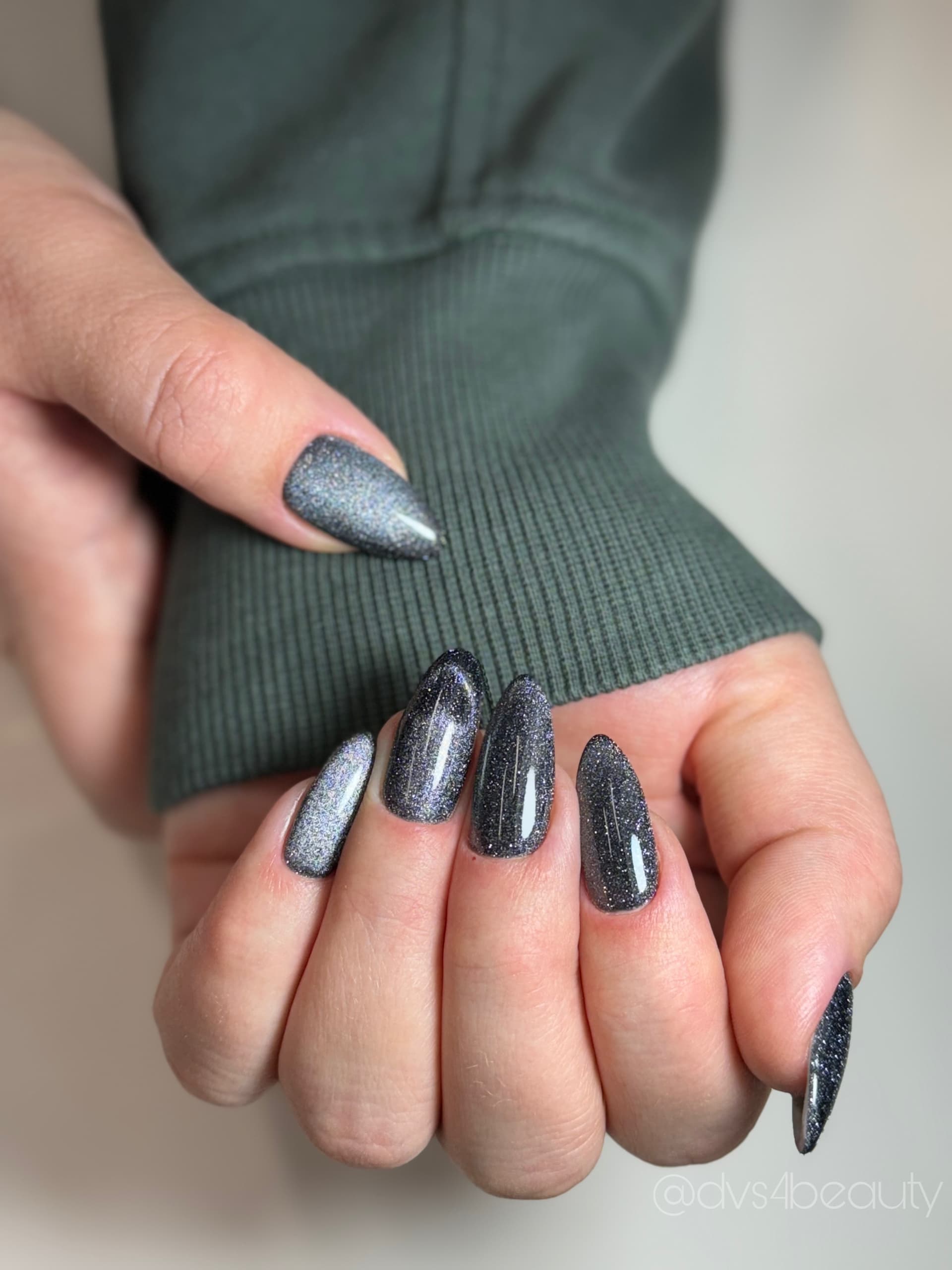 Charcoal nails with iridescent flake accents
