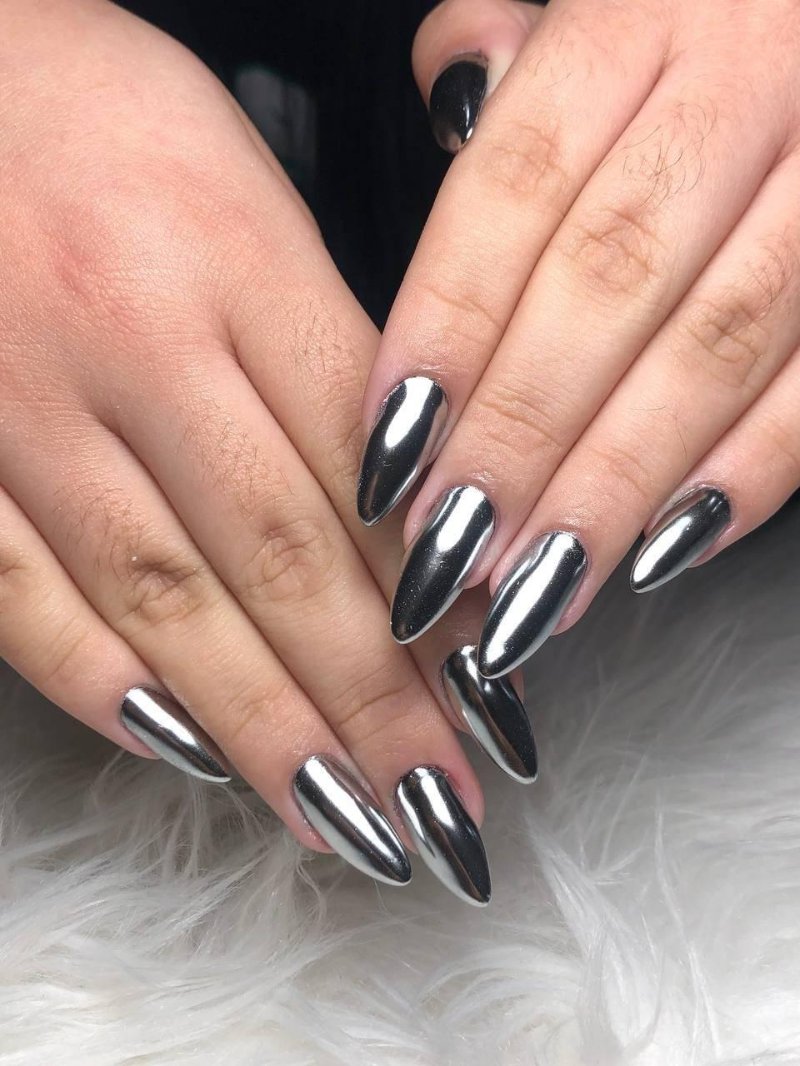 Mirror-shine silver chrome on stiletto nails