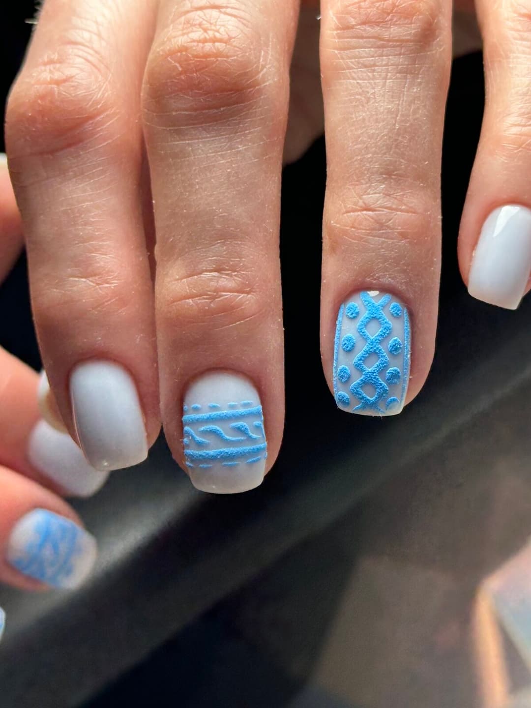 Dusty blue matte nails with cable-knit sweater accents