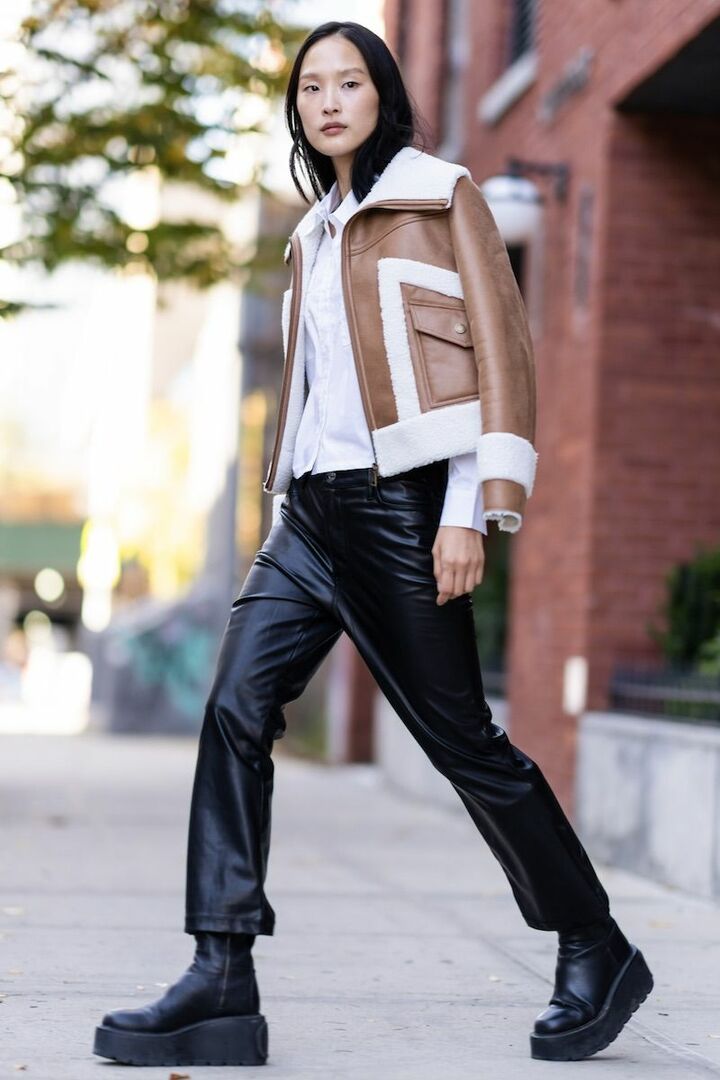 Coat with a cozy shearling collar styled in a winter outfit