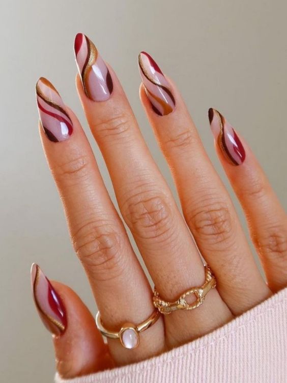 Burgundy gel nails with a pearly glazed donut chrome finish