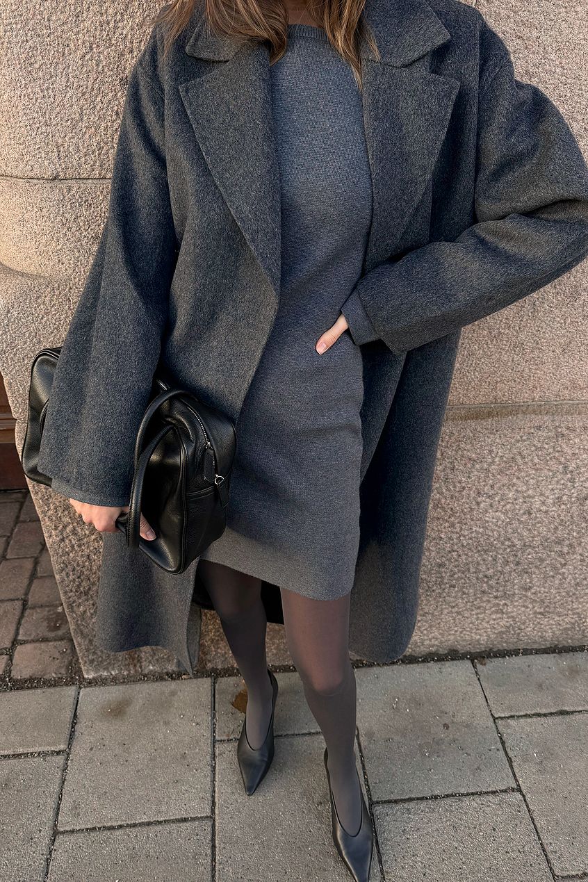 Grey knitted mini dress with padded shoulders, a Scandinavian knit dressing piece