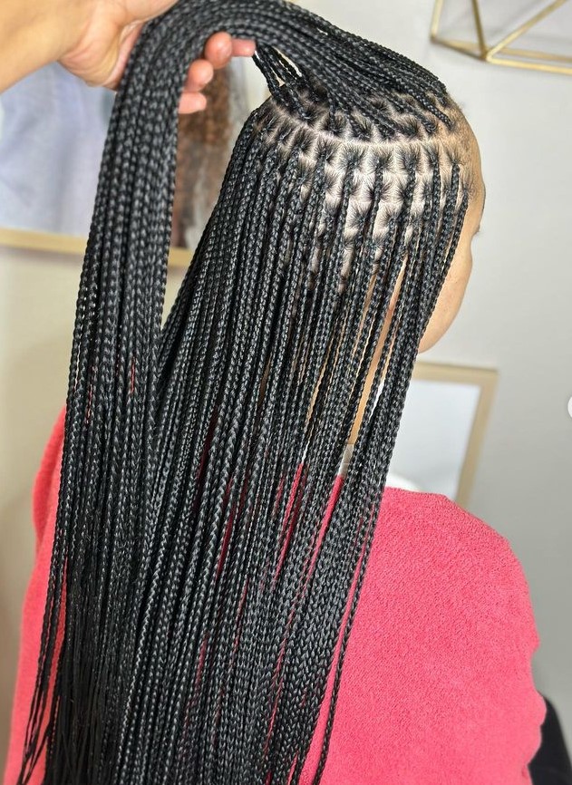Waist-length knotless box braids with natural movement