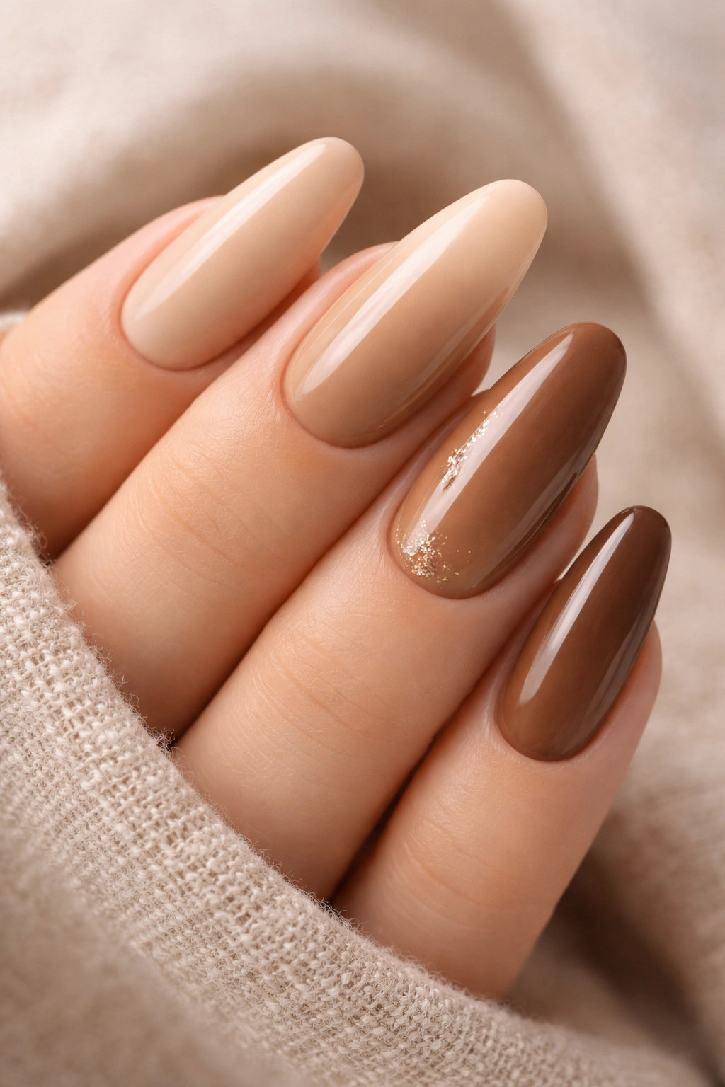 Long almond nails with a latte ombre fading from creamy beige at the base into rich mocha brown tips