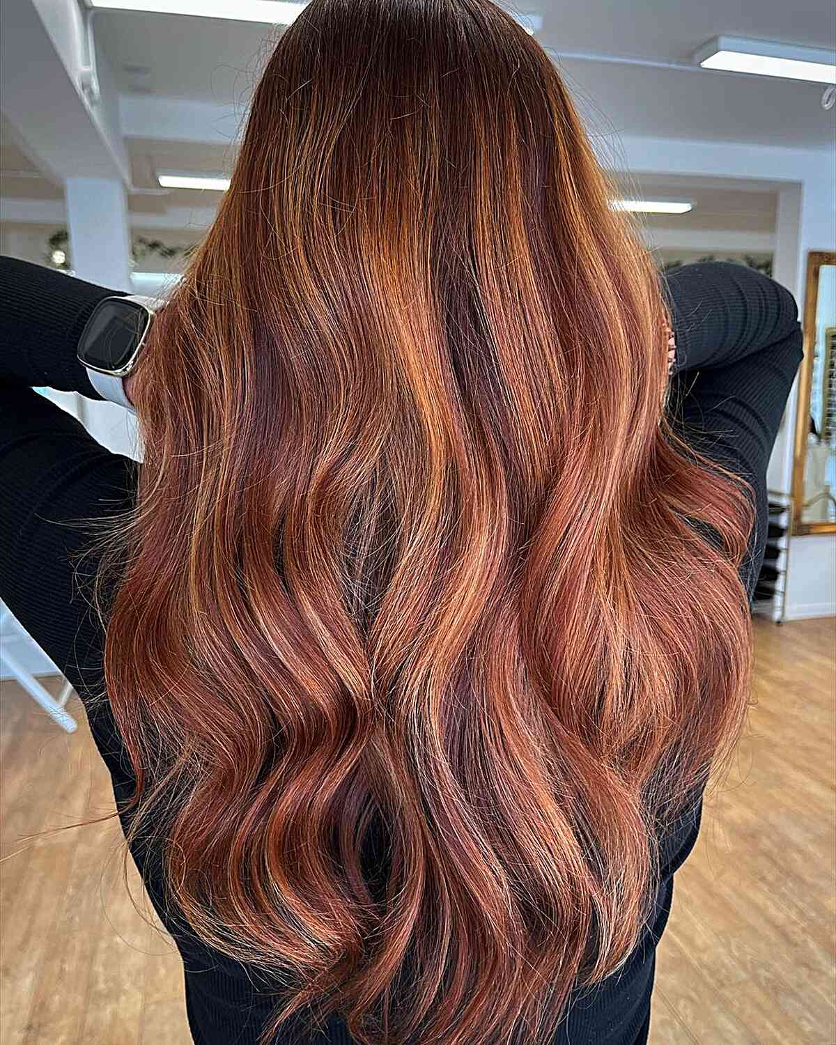Long layered auburn copper brown hair with balayage waves