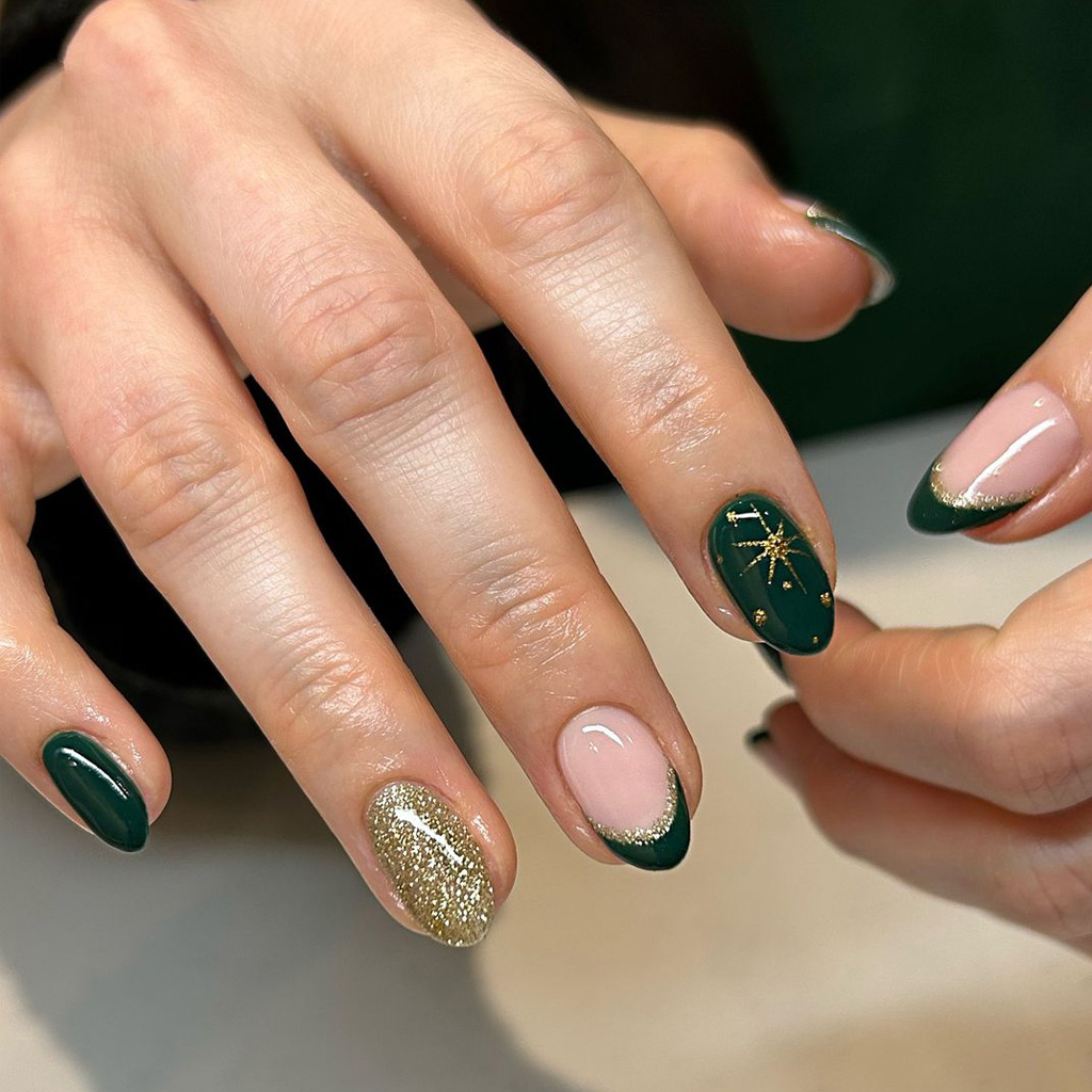Emerald green almond nails with a gold micro-glitter accent nail