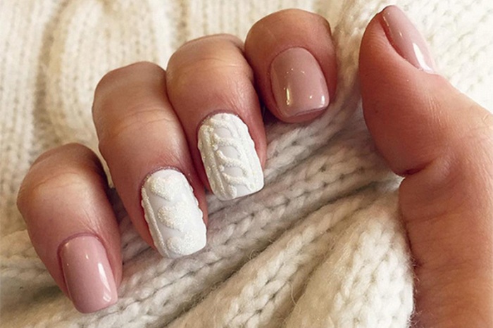 Blush nude short square nails with white cable knit texture accents