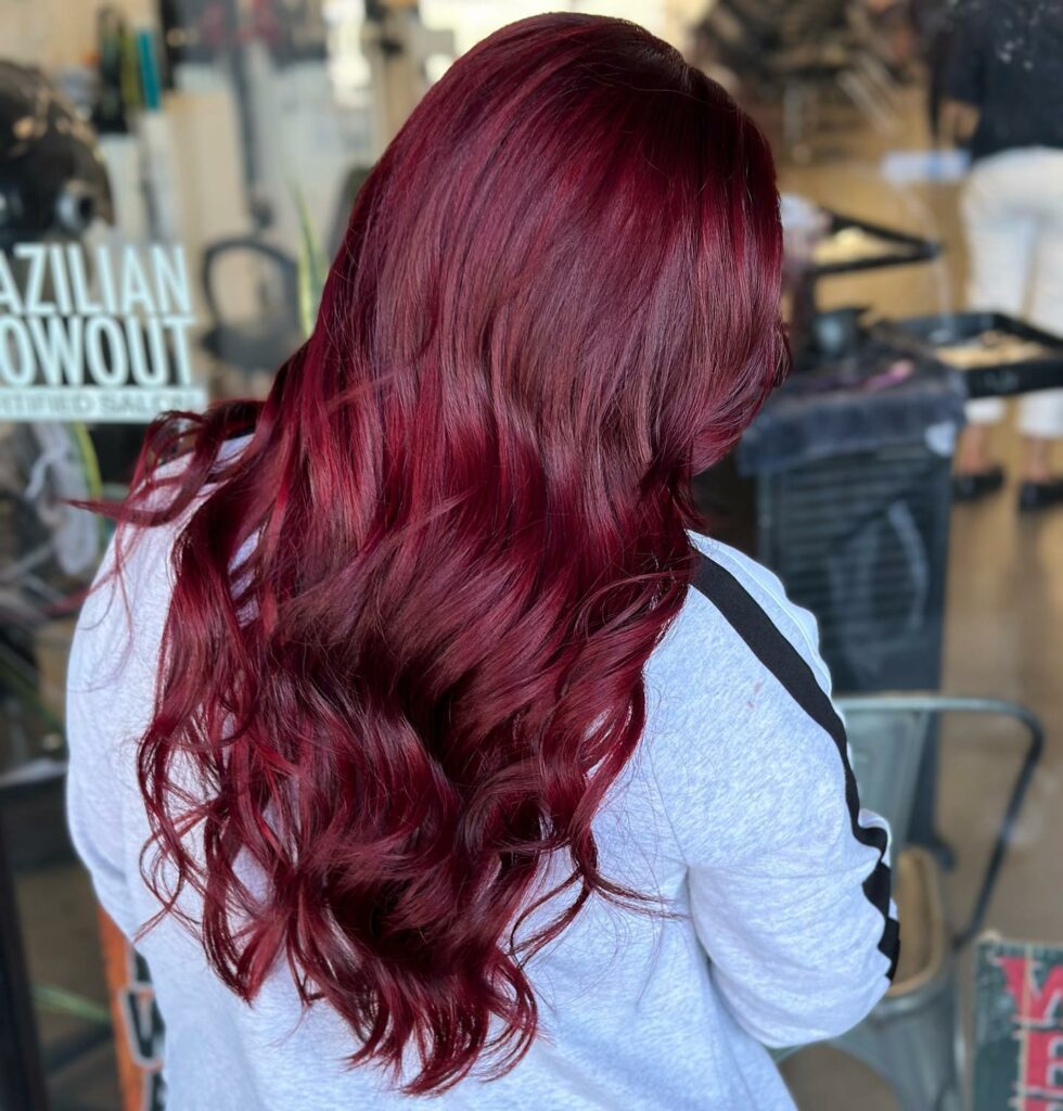 Deep merlot red hair color on long hair